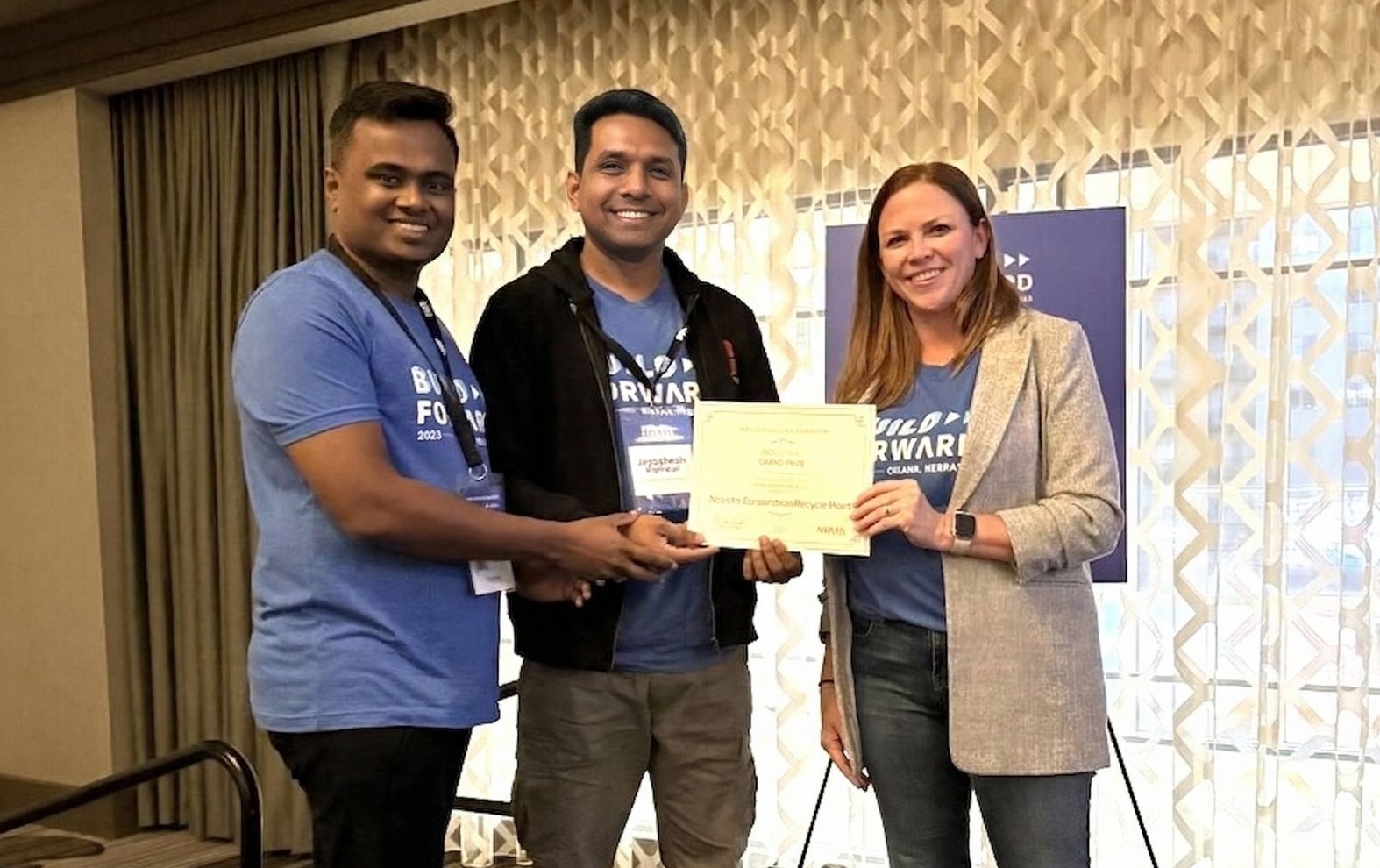Jayaghosh Rajendran and Vinayadas Vijayan receiving the Grand Prize at Build Forward Conference 2025